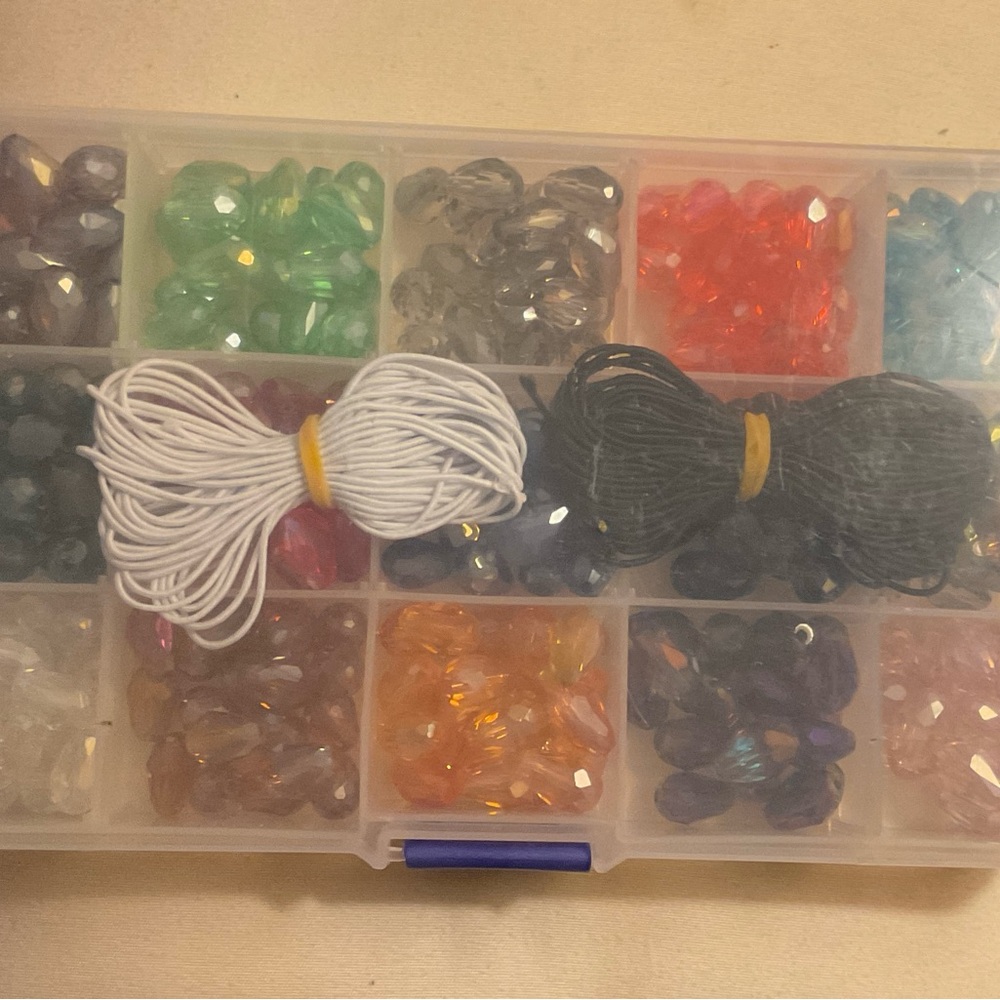 Teardrop bead set. Great for crafts . New never opened. Assorted colors